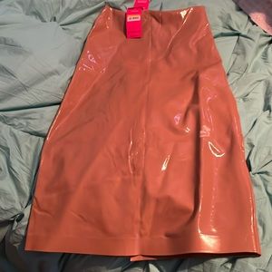 Size small new with tags commando, nude colored below the knee skirt.
